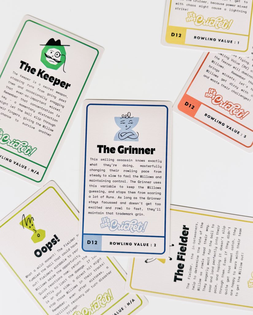 Characters - Chance & Counters Assorted game cards on a white surface, featuring titles like The Keeper and The Grinner with colored borders and illustrations.